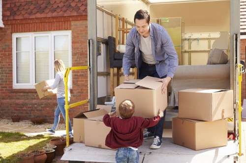 Customer safely moving storage items at a self storage facility