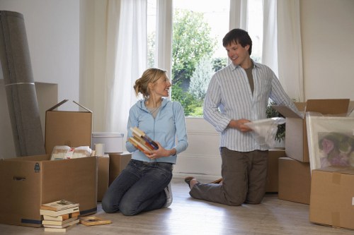 Organised boxes and furniture stored safely in a Barnes self storage space
