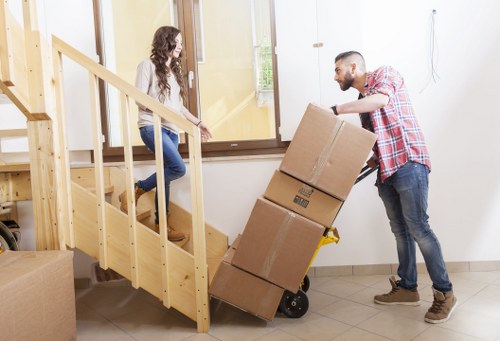 Professional movers handling furniture during a Barnes small removal