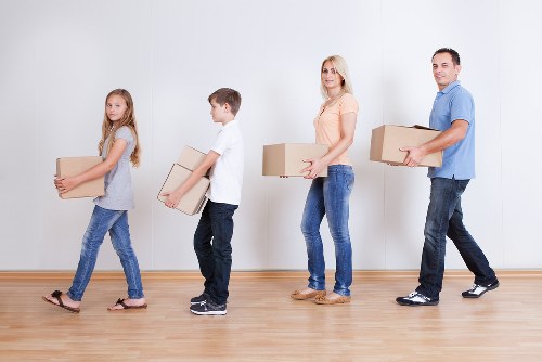 Packed office boxes ready for relocation in Barnes business move
